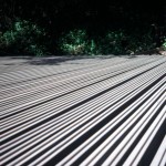 Fairfax, CA. Staining cedar siding boards before installation. Marshall Johnson Painting.